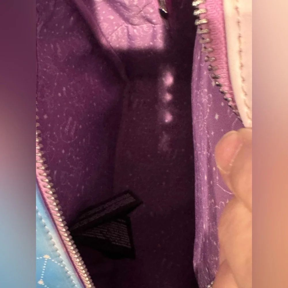 Loungefly Disney Mickey Mouse Pastel Sky Backpack** 2 light scuffs on the front.